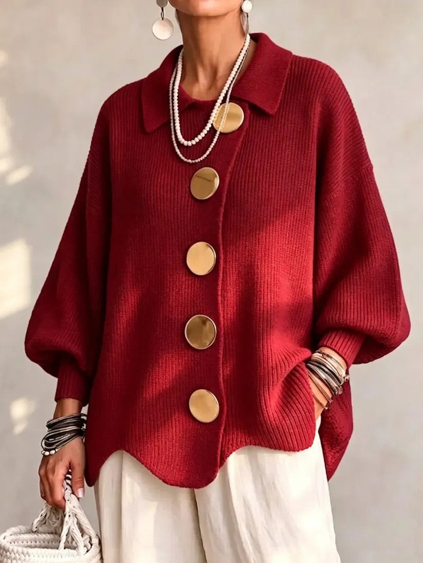 Bright red version worn with cream trousers, showing ribbed cuffs and large gold buttons 11