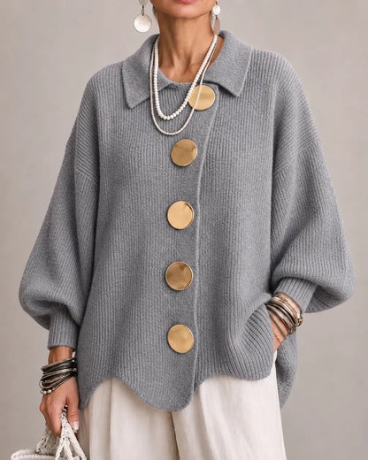 Mid grey version worn by a model, with five gold buttons and a relaxed oversized fit 18