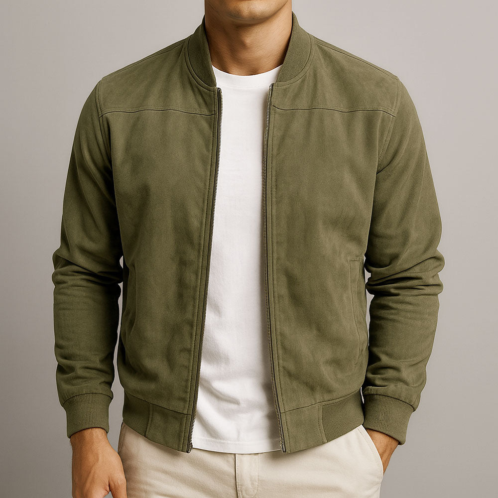 Front view of the jacket in olive green, worn open over a white t-shirt with cream trousers. 3