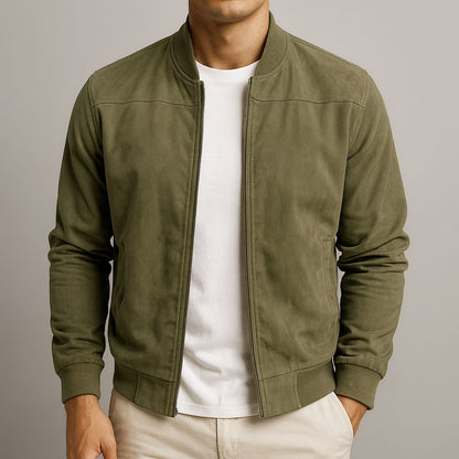 Front view of the jacket in olive green, worn open over a white t-shirt with cream trousers. 3