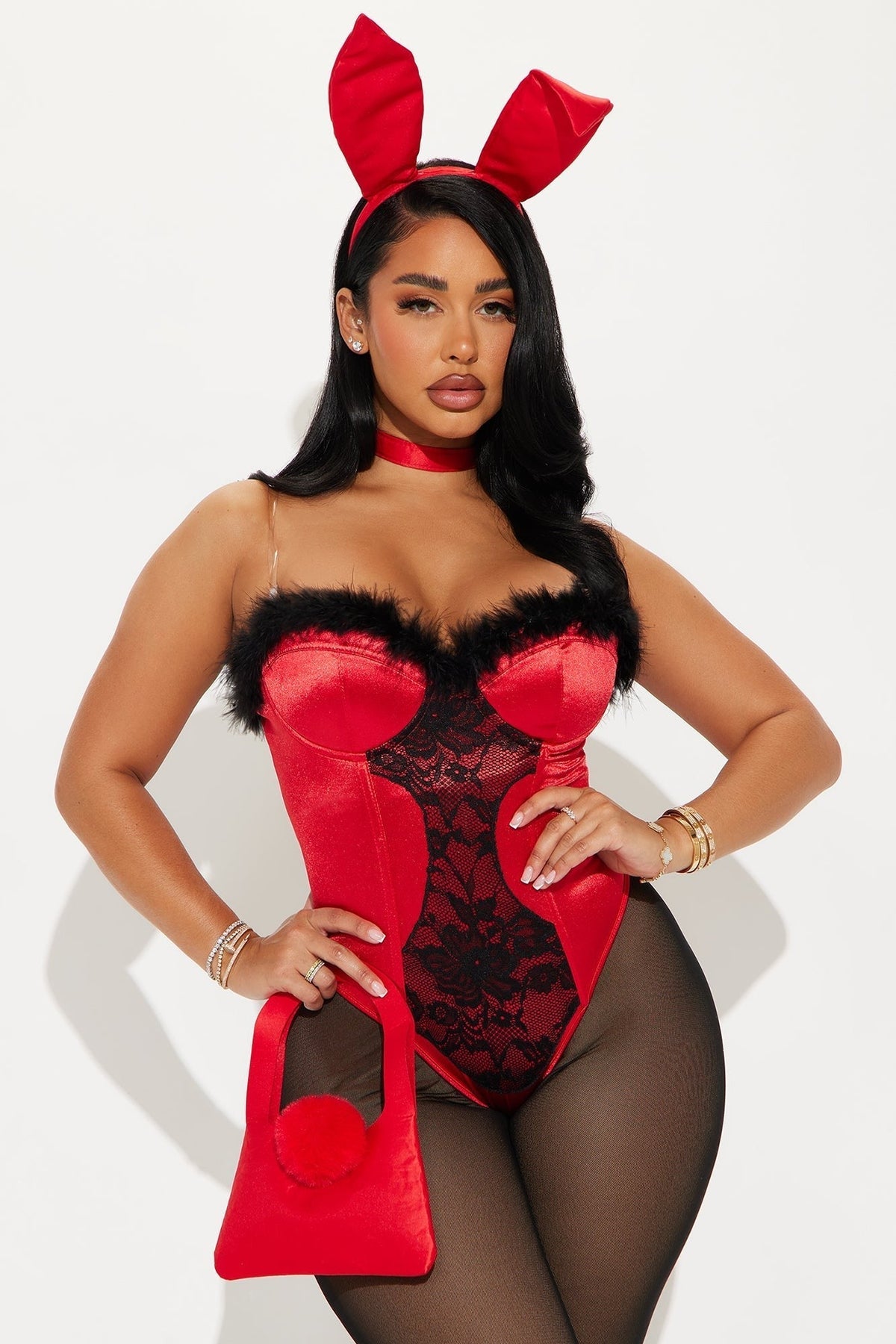Close-up of the red satin bodysuit with black feather trim and lace panel, worn with ears and handbag 1