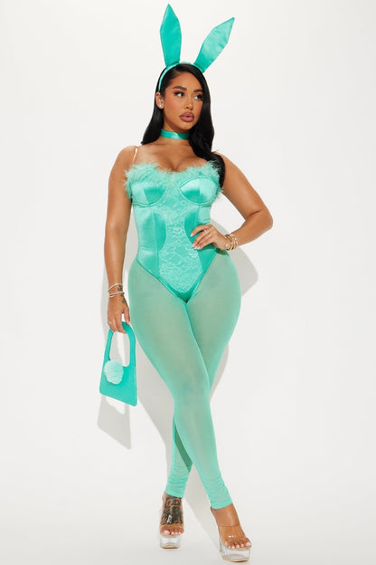 Full-length view of the set in mint green with feather trim, lace panel and sheer leggings 5