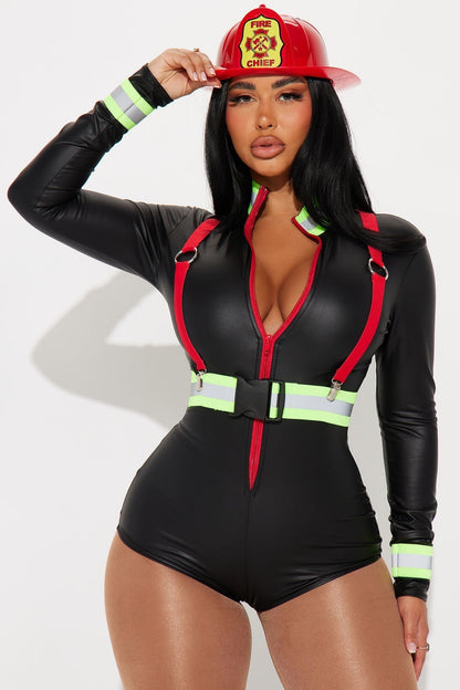 Close front view of the model touching the red helmet brim, showing bodysuit, red braces and belt 2