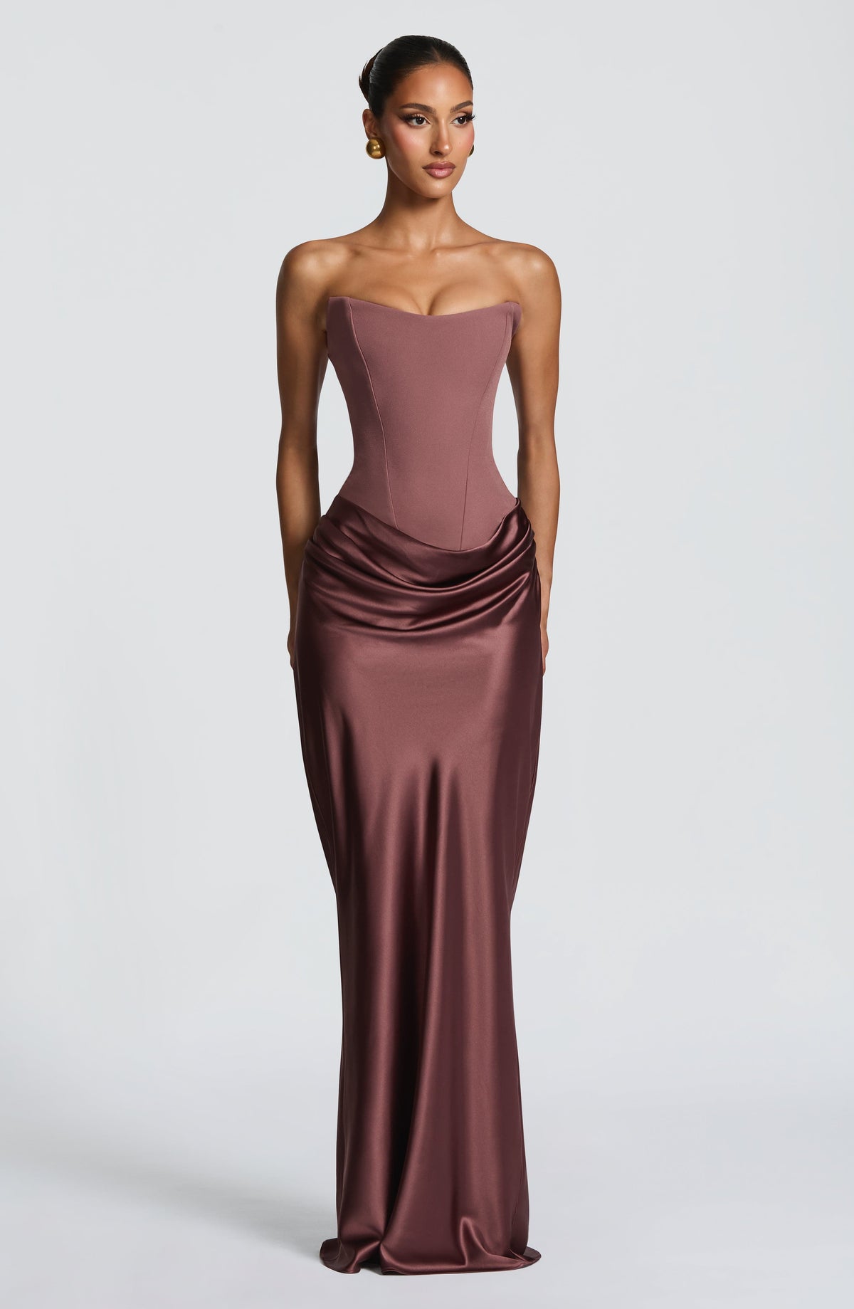 Front view of the brown corset maxi dress with draped satin skirt falling to the floor 40