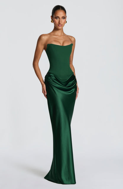 Three-quarter view of the emerald green strapless dress with fitted satin skirt 32