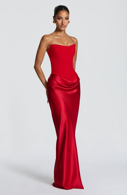 Three-quarter front view of the red dress without the scarf, showing the satin cowl skirt 17