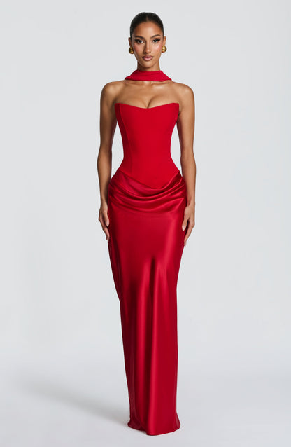 Red version of the strapless corset dress worn with a matching neck scarf, front view 11