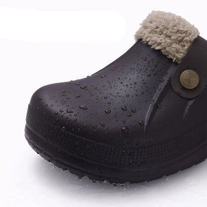 Close-up of a dark brown clog toe covered in water droplets, showing its waterproof surface 4