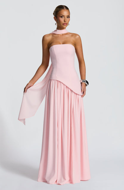 Front view of pale pink strapless dress with asymmetric bodice and gathered skirt, scarf held out 22