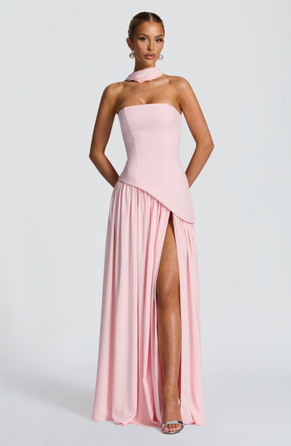 Front view of light pink strapless maxi dress with neck scarf, asymmetric waist and gathered skirt with high slit 20