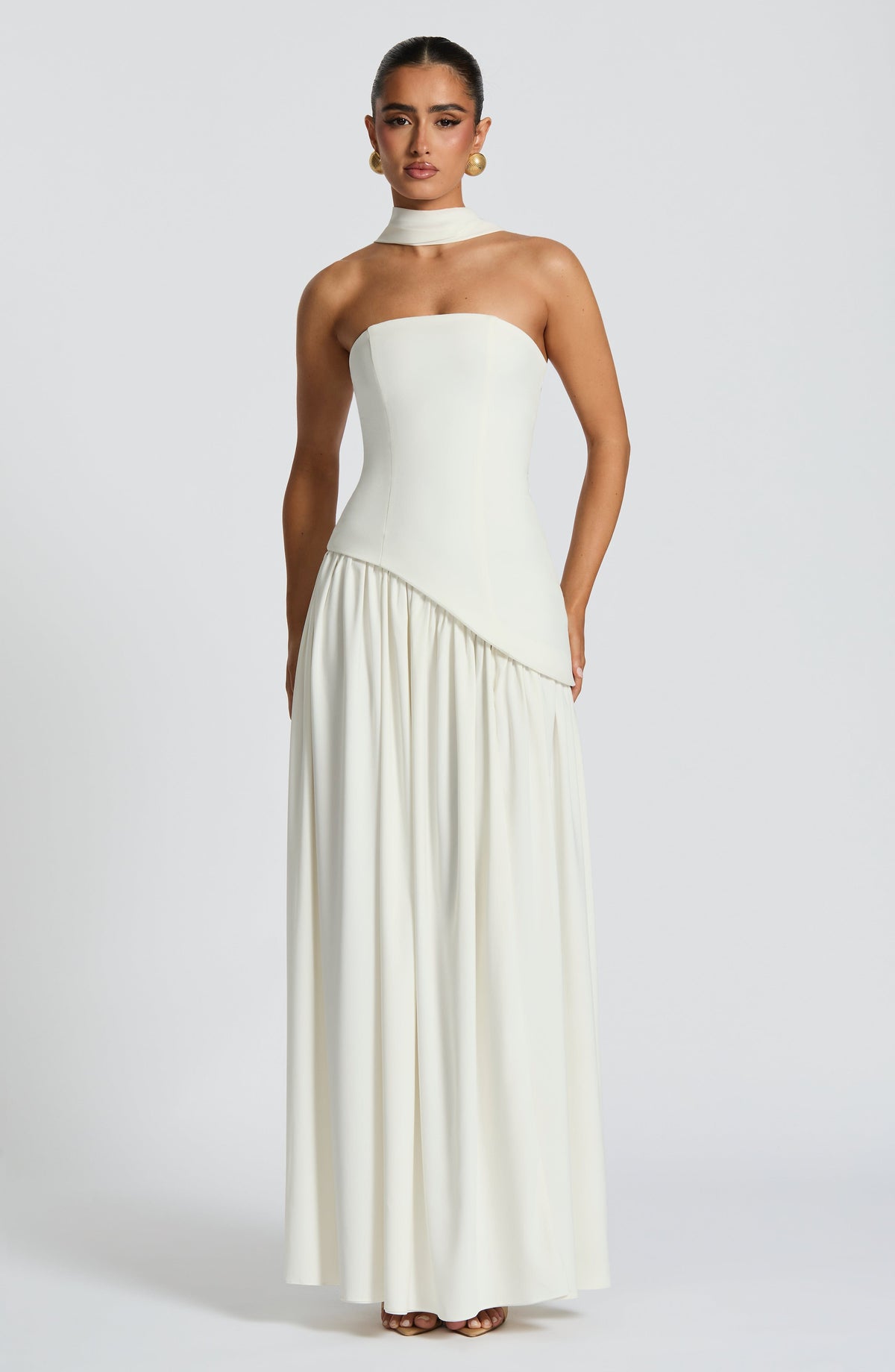 Front view of cream strapless maxi dress with scarf collar and asymmetric bodice 34
