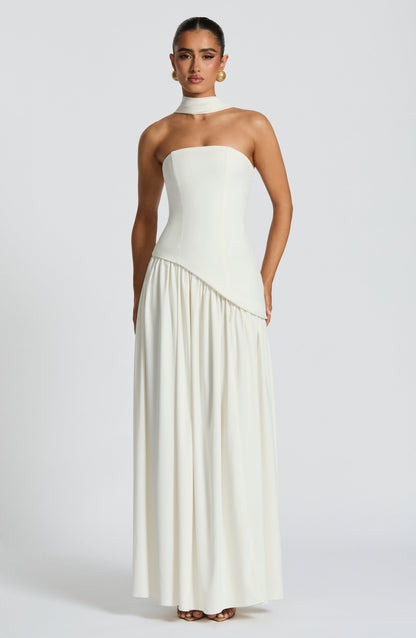 Front view of cream strapless maxi dress with scarf collar and asymmetric bodice 34
