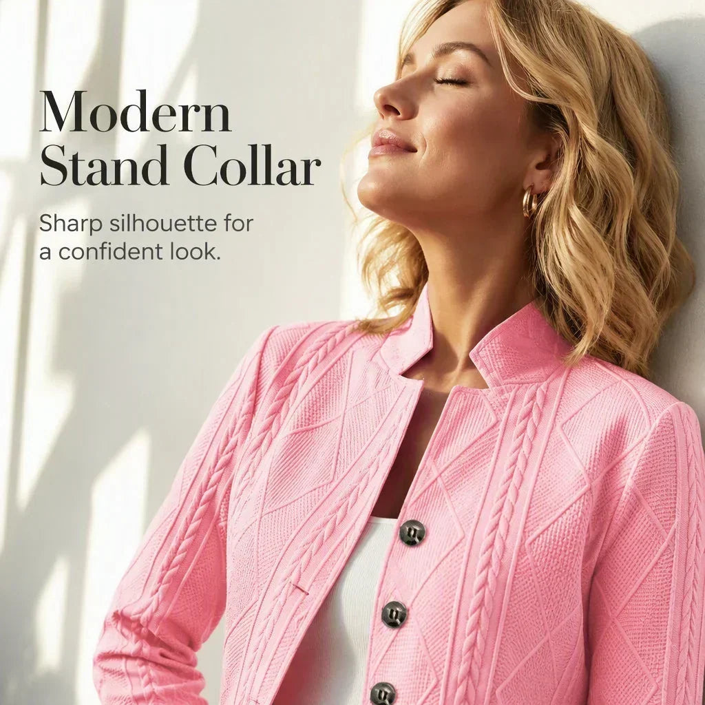 Pink textured blazer worn by a woman leaning back against a wall, showing the stand collar 19