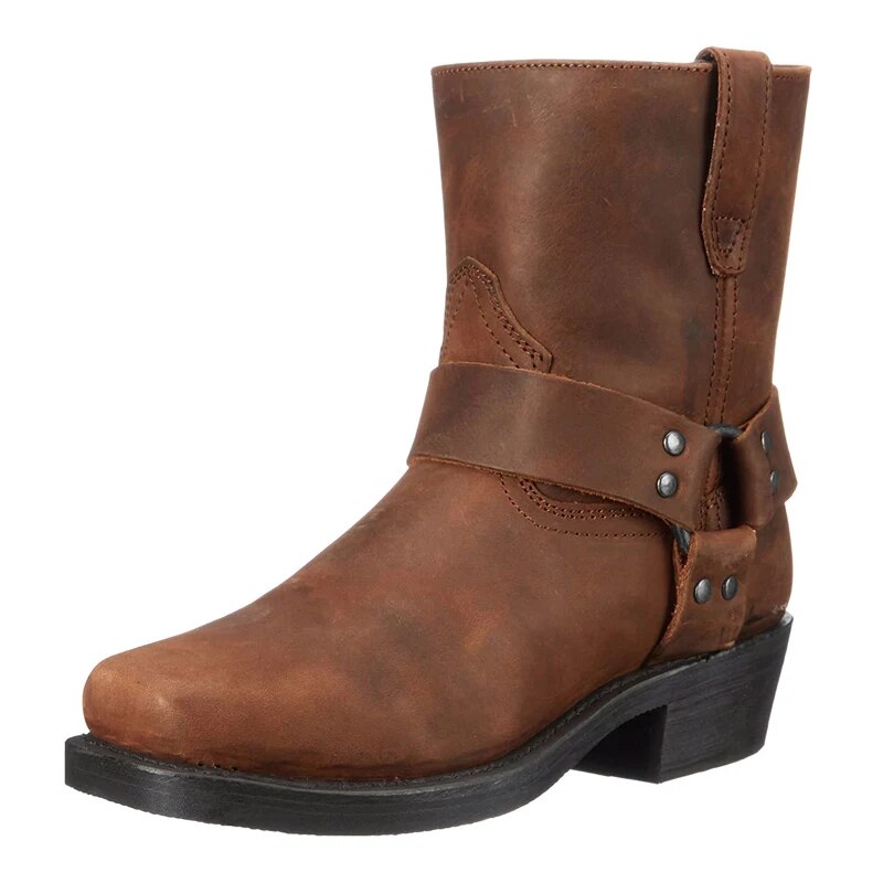 Single brown leather ankle boot at a three-quarter angle, showing the studded harness strap, square toe and stacked heel. 1