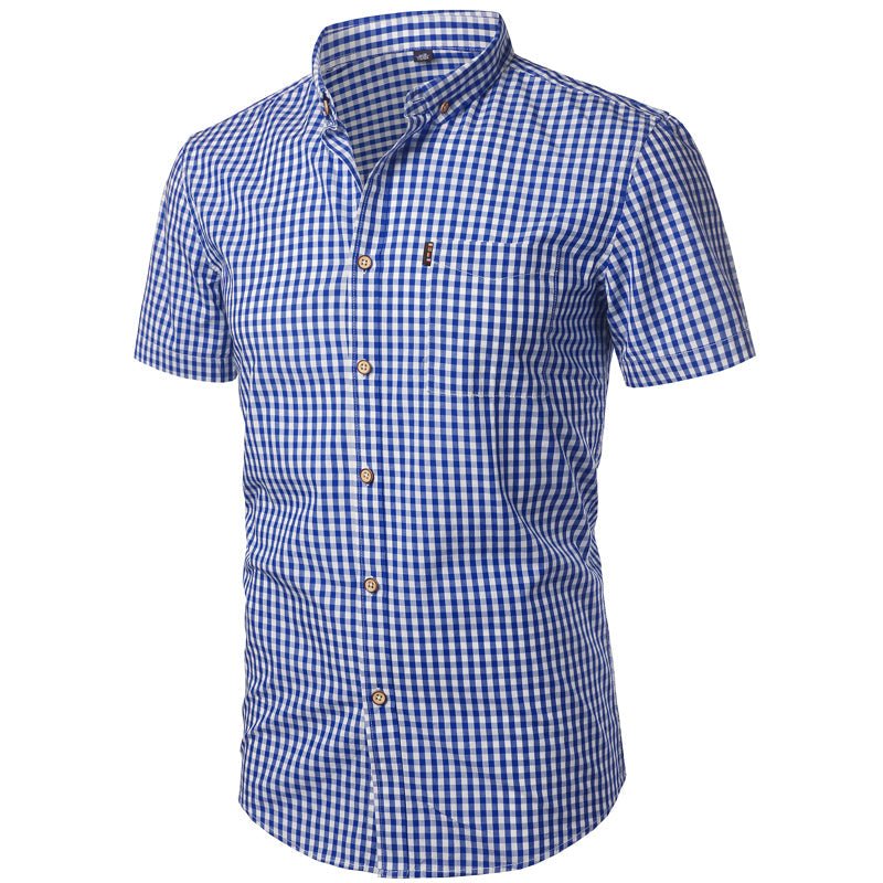 Royal blue gingham shirt shown at a three-quarter angle, highlighting the chest pocket, short sleeves and curved hem. 5