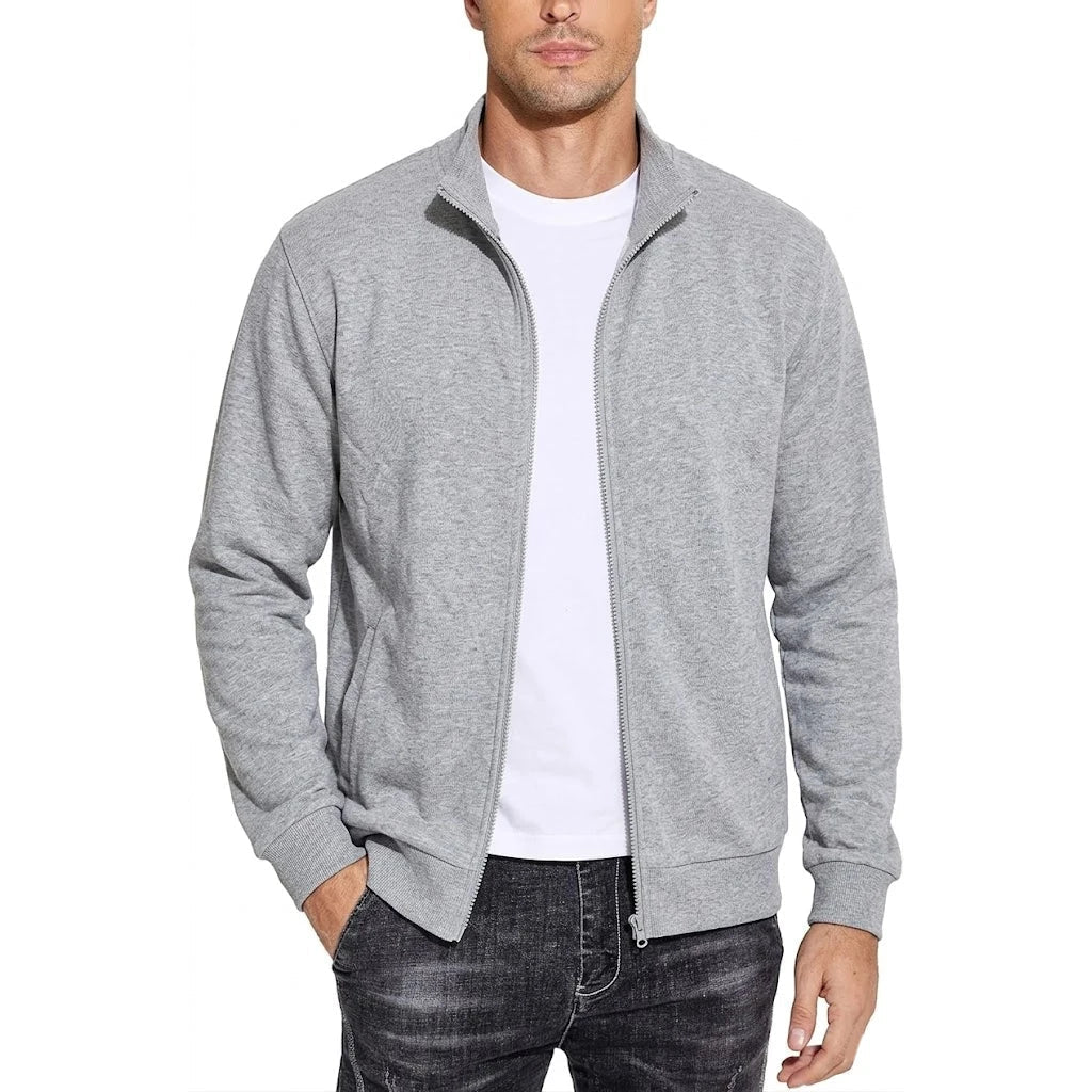 Front view of the zip-up sweatshirt jacket in light grey marl, worn open over a white T-shirt with side pockets visible. 7