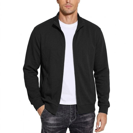 Man wearing the stand-collar zip-up sweatshirt jacket in black, unzipped over a white T-shirt with one hand in a pocket. 1