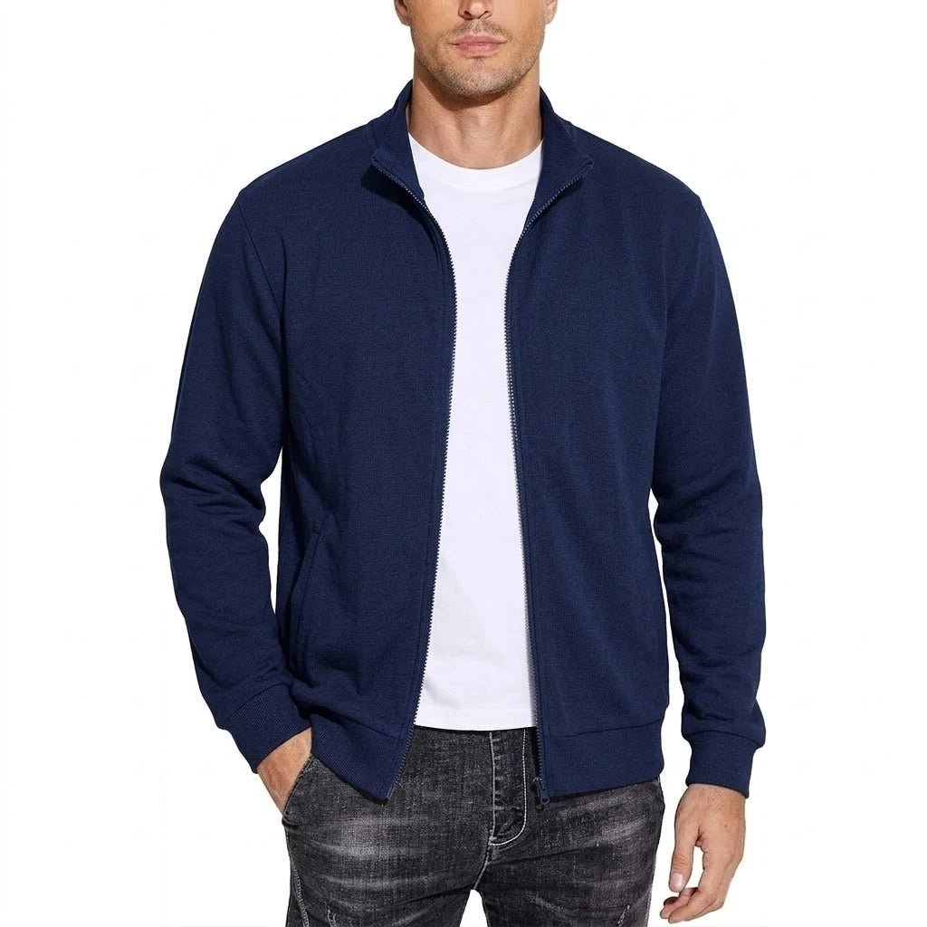 Front view of the zip-up sweatshirt jacket in navy blue, worn open over a white T-shirt and dark jeans. 3