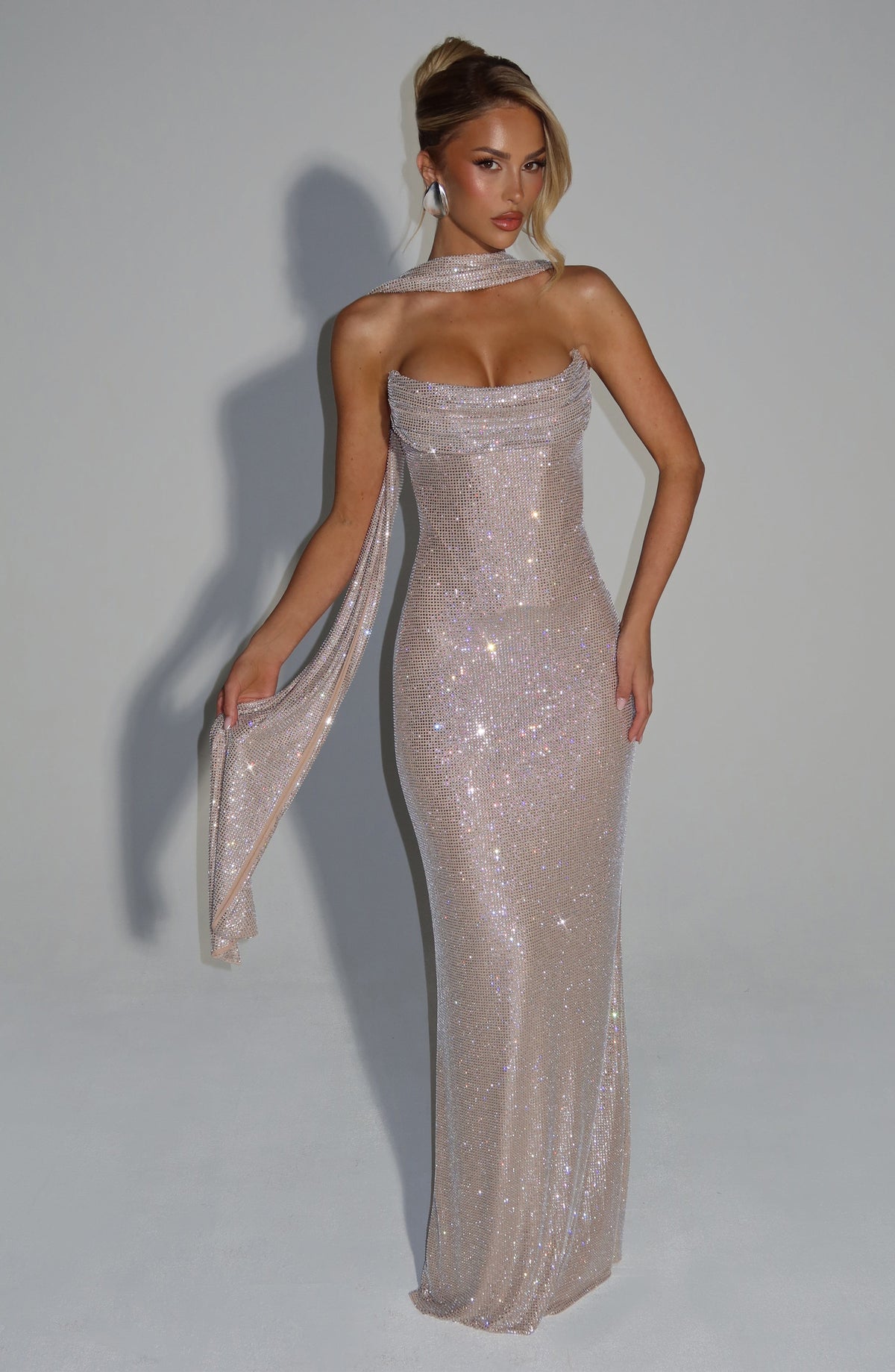 Champagne dress styled with a rhinestone mesh scarf draped over one shoulder, front view 17