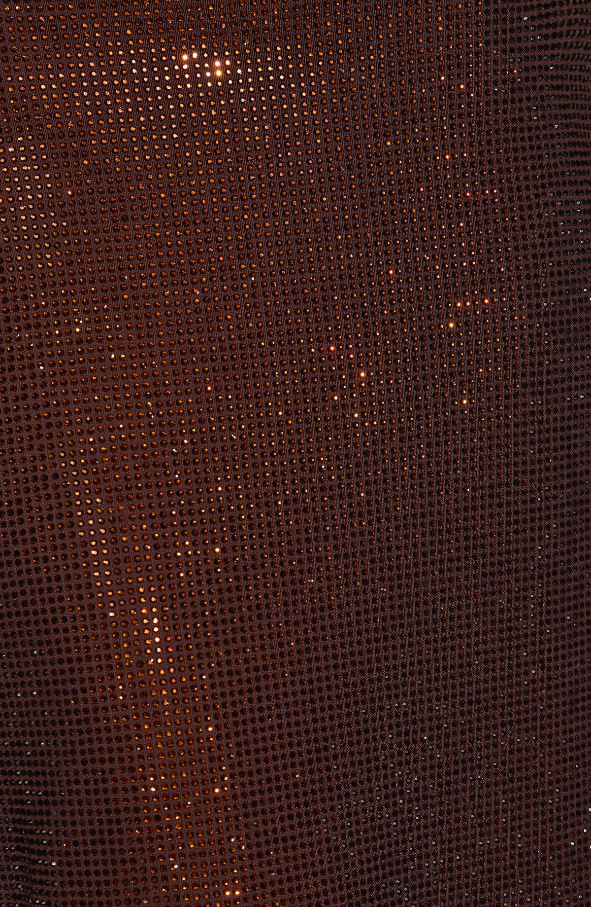 Extreme close-up of the brown mesh fabric covered in tiny sparkling rhinestones 9