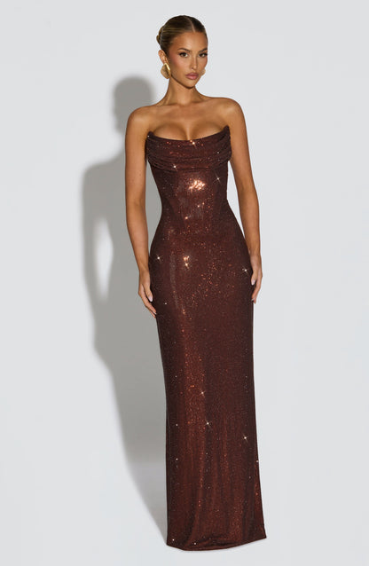 Full-length front view of the brown dress against a pale studio backdrop 14