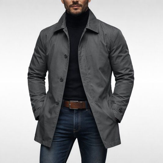 Front view of the grey coat worn open on a model, with three buttons and buttoned cuff tabs 2