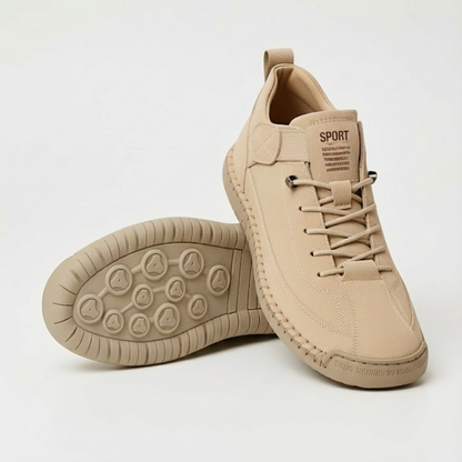 Pair of beige suede-look lace-up trainers, one shown from the side, one sole-up with circular tread 1