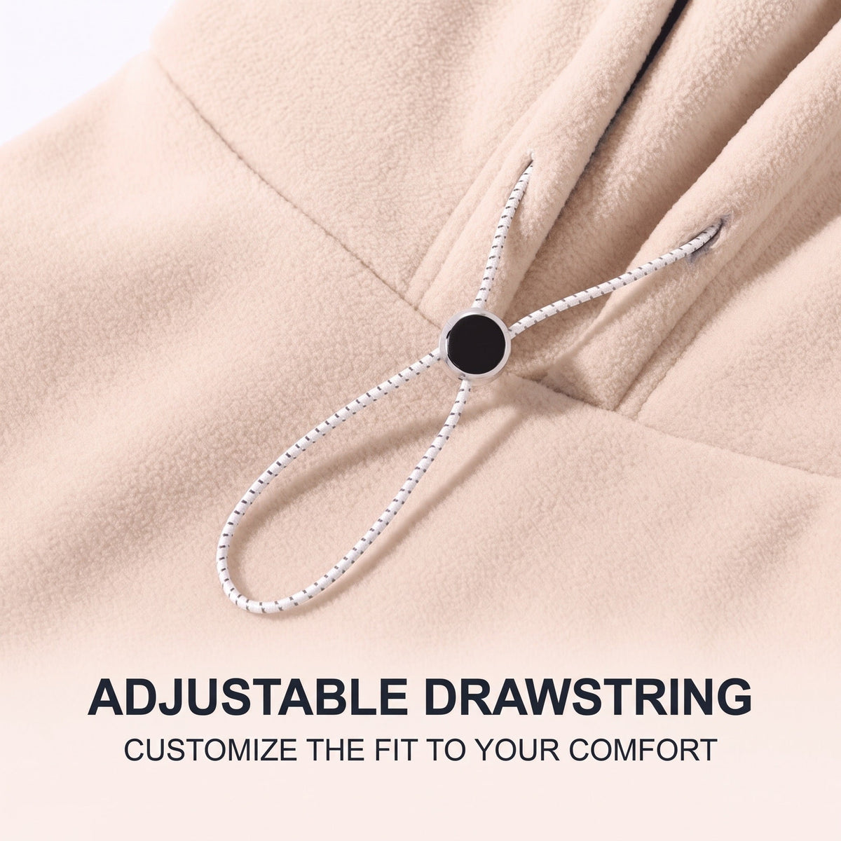 Close-up of the elasticated drawstring and black toggle on cream fleece fabric 5