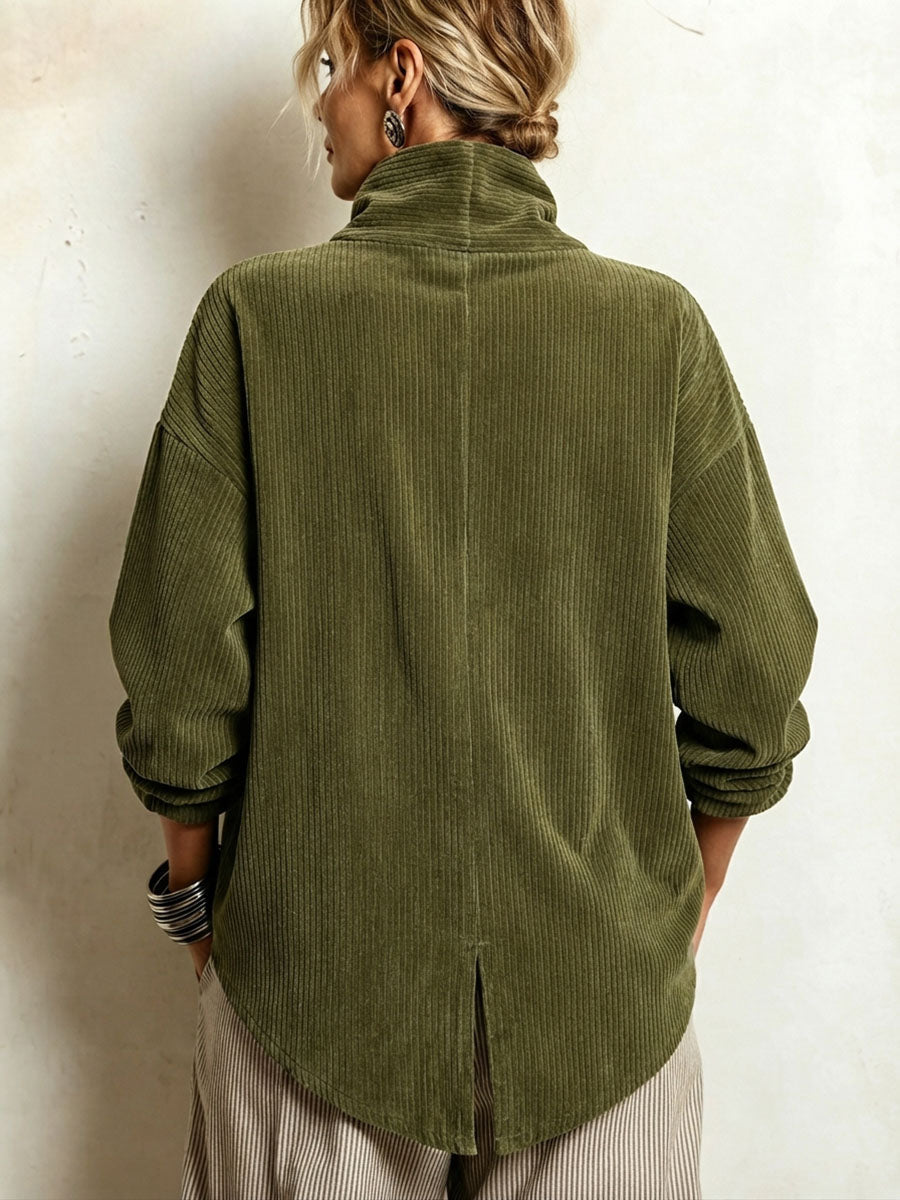 Back view of the olive ribbed corduroy sweater showing the centre seam, high collar and curved hem with a small slit 4