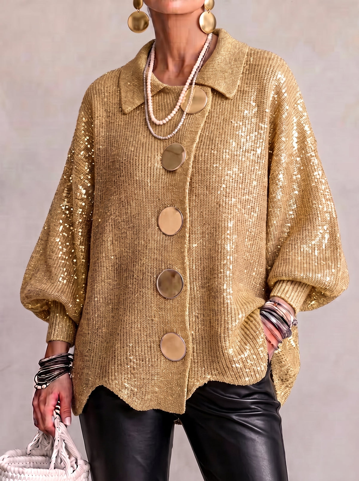 Metallic gold sequinned version styled with black leather trousers and large disc earrings 3