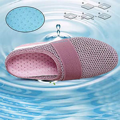 Pink mesh slip-on shown from above over a water ripple, highlighting the cushioned insole and breathable fabric 14