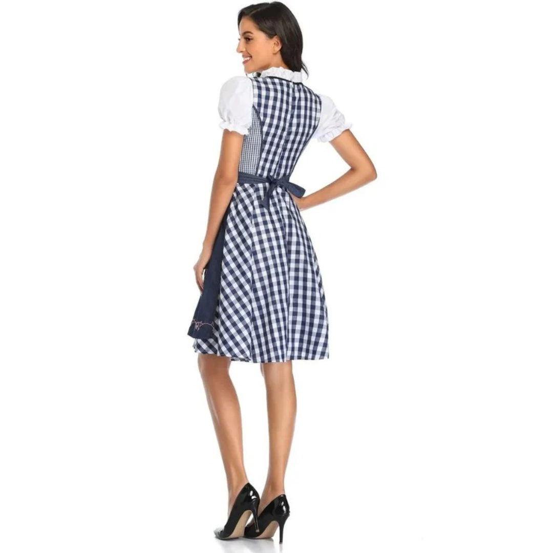 Back view of the navy and white check dirndl showing the fitted checked back bodice and navy apron bow. 11