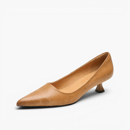Single tan leather pump on a white background, angled to show pointed toe and flared kitten heel 1