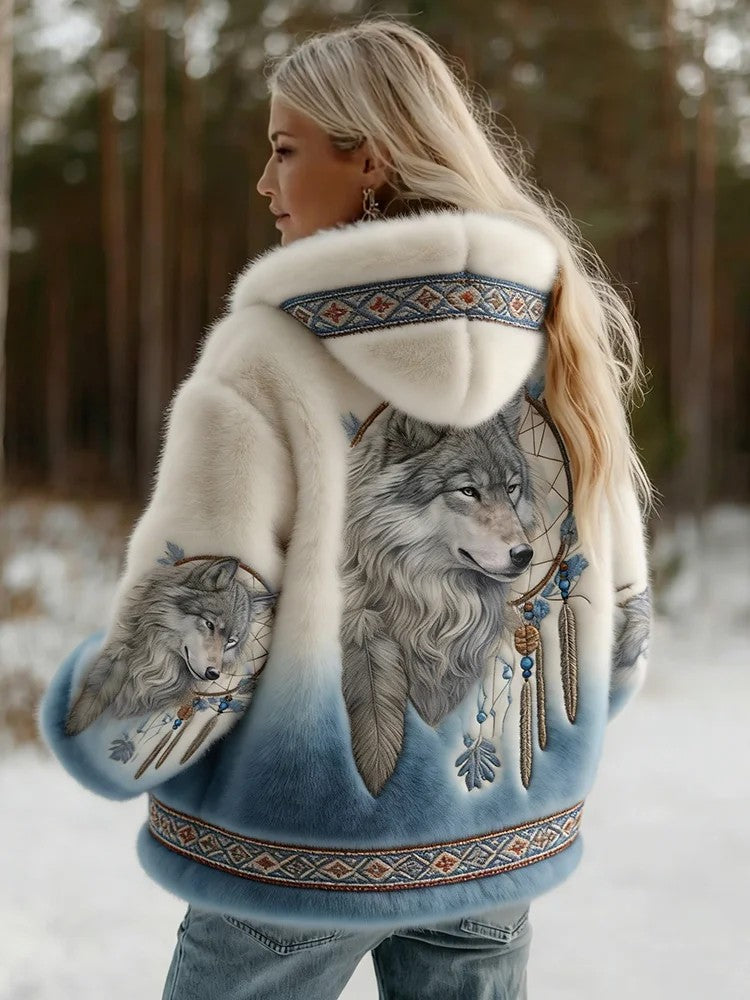 Back view on a snowy woodland path of the fluffy hooded jacket with white-to-blue fade and wolf dreamcatcher print 1