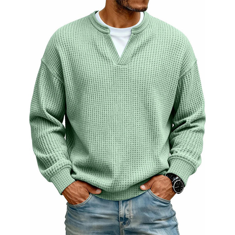 Front view of the waffle knit top in mint green over a white tee 10