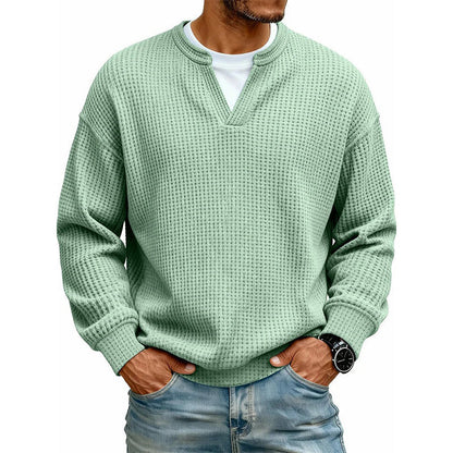 Front view of the waffle knit top in mint green over a white tee 10