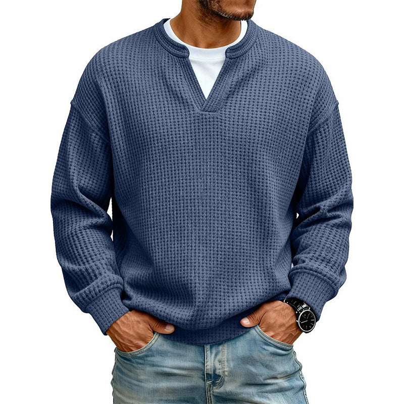 Front view of the waffle knit top in dark denim blue over a white tee 13