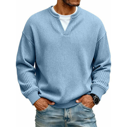 Front view of the waffle knit top in light blue over a white tee 12