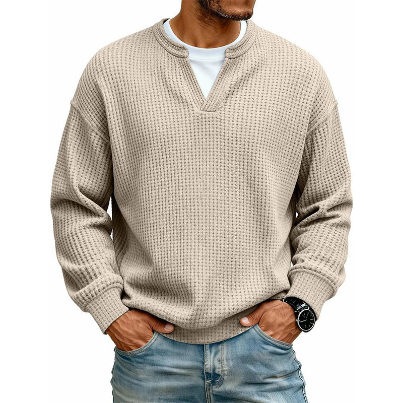 Front view of the waffle knit top in beige over a white tee 11