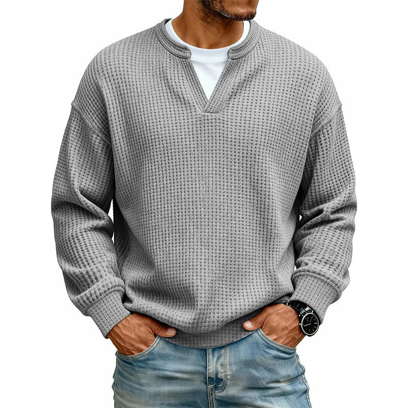 Front view of the waffle knit top in light grey over a white tee 17