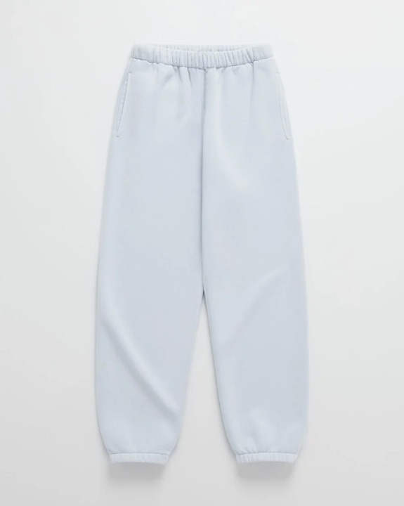 Flat lay of matching pale blue joggers with an elasticated waistband and gathered ankle cuffs 9