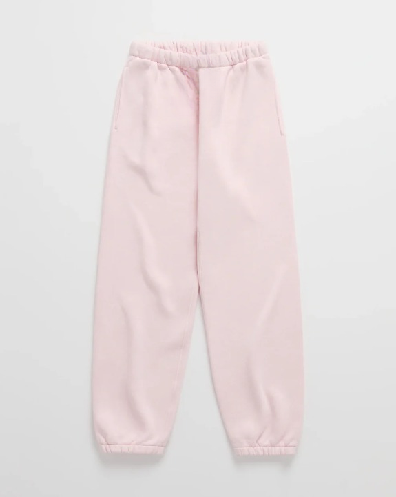 Flat lay of matching light pink joggers with an elastic waist, side pockets and cuffed ankles 8