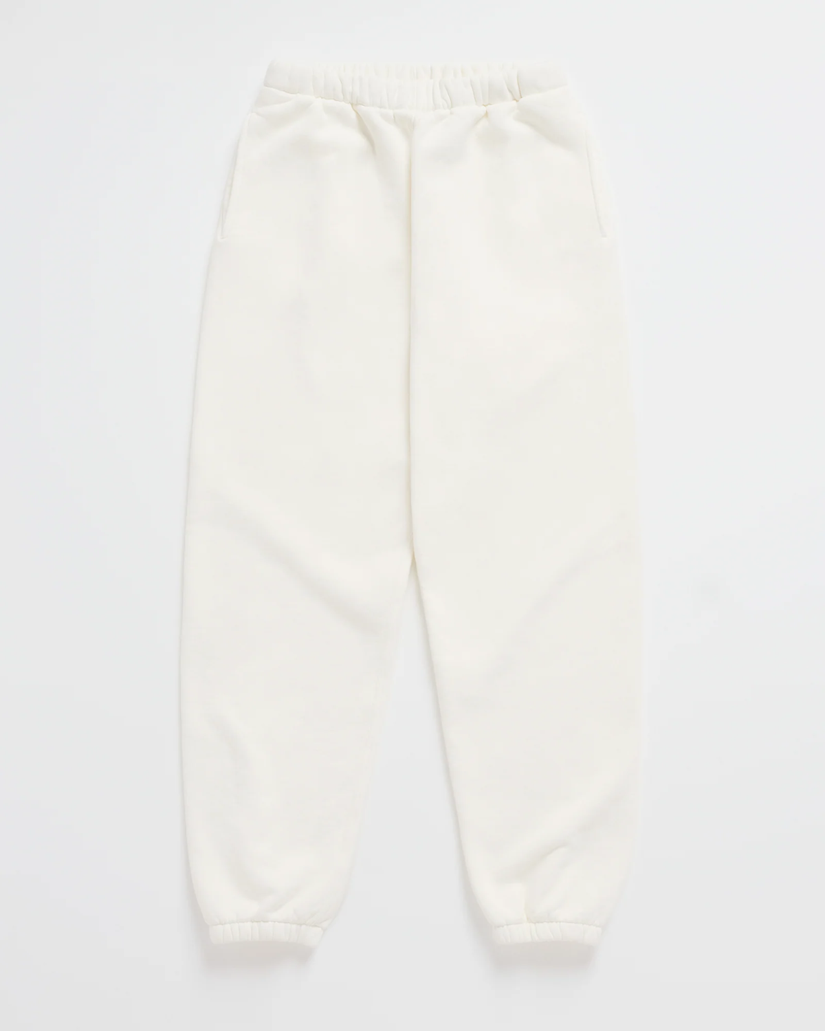 Flat lay of matching cream joggers with a gathered elastic waistband and elasticated ankle cuffs 7