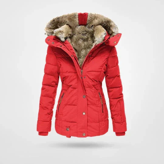 Front view of the quilted hooded jacket in bright red, with a plush fur-lined hood, press studs and zipped hand pockets. 4