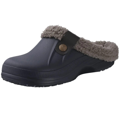 Dark navy clog with taupe fleece lining and a dark strap fastened with a bronze button 2