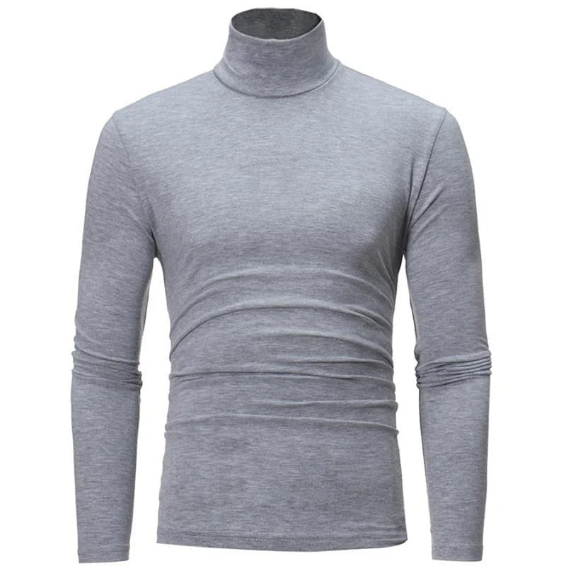 Front view of the long-sleeved high neck top in light grey marl on a plain background 4
