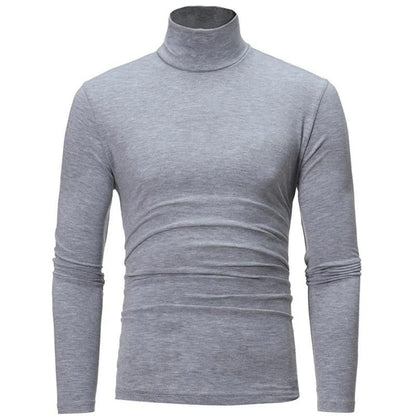 Front view of the long-sleeved high neck top in light grey marl on a plain background 4
