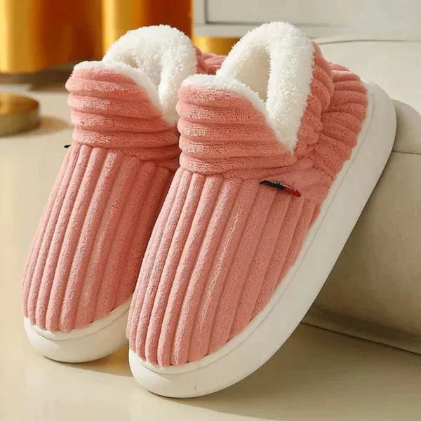 Pair of coral-pink ribbed plush slippers with white fleece lining and thick cream sole 5