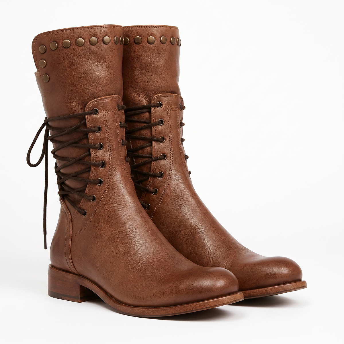 Pair of tan brown leather boots from the front and side, showing the studded collar, dark laces and low stacked heel. 2