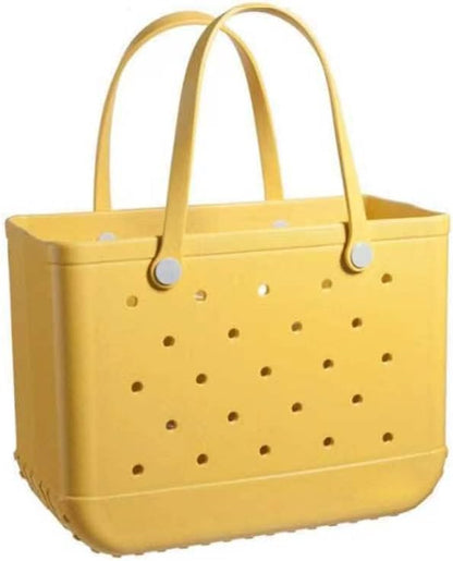 Yellow perforated tote with two upright handles fixed by white round buttons, shown against a plain background. 5
